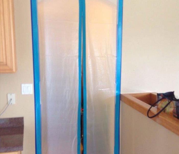 containment set up during mold remediation to protect the unaffected areas of the Renton home