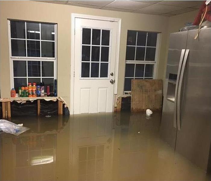 Flooded home, refrigerator, table flooded