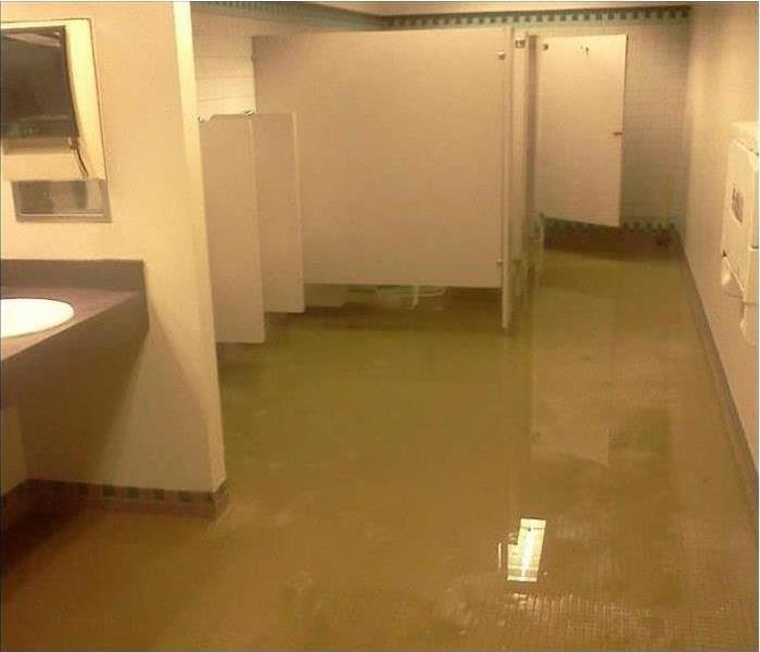 Commercial bathroom flooded